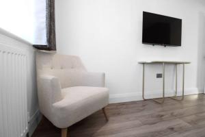 Et tv og/eller underholdning på Stunning 2 bedroom in Luton ! + 5 billeder