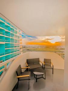 Posezení v ubytování JD Serviced Suite at Azure North Pampanga