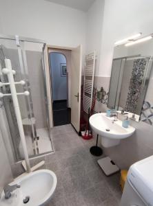 a bathroom with two sinks and a shower at La Mimosa in Rapallo