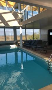 Bazén v ubytovaní Studio avec Piscine résidence Natureva by 8H alebo v jeho blízkosti