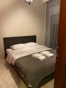 Postel nebo postele na pokoji v ubytování R&K MODERN APARTMENT