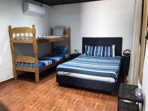 Ліжко або ліжка в номері Casa mono ambiente y piscina.
