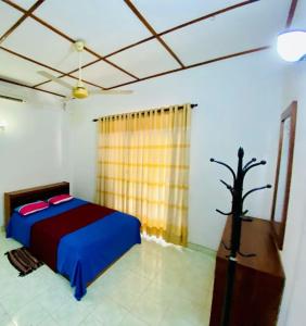 Letto o letti in una camera di Punchi Walawwa - Guest House - Holiday Bungalow