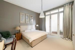 Ένα ή περισσότερα κρεβάτια σε δωμάτιο στο 雅筑私旅