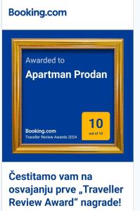 a picture of a picture in a gold picture frame at Apartman Prodan in Sombor