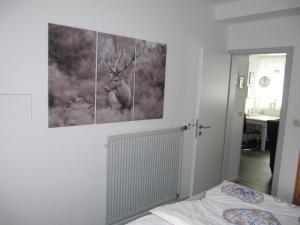 Ein Bett oder Betten in einem Zimmer der Unterkunft Piepmäker Stübchen