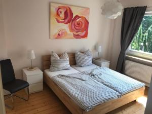 Кровать или кровати в номере Haus Cassiopeia Borkum