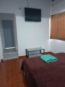 Ein Bett oder Betten in einem Zimmer der Unterkunft Hostel el Amanecer