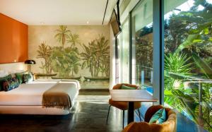 Cama ou camas em um quarto em Casa Vela Boutique House