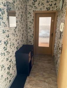 a hallway with a door and a window in a room at Goethestraße in Staßfurt