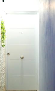 a white cabinet with three drawers in a room at Vivienda El Viajero in Valverde