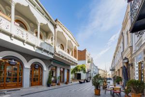 an empty street in a city with buildings at The heart of the ancient district 3BD-2BATH apartament in Tbilisi City