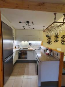 Kuchnia lub aneks kuchenny w obiekcie UNIQUE 57m2 Terraza BBQ vista mágica1-0