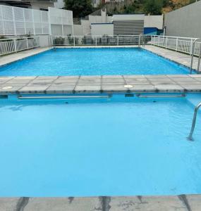 Πισίνα στο ή κοντά στο departamento reñaca