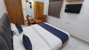 TV a/nebo společenská místnost v ubytování Hotel The Grand Jashi Residency