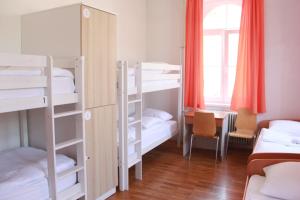 Letto o letti in una camera di C - Punkt Hostel