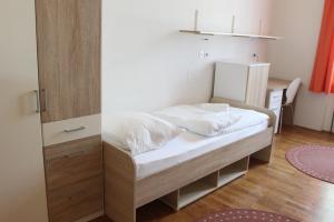 Letto o letti in una camera di C - Punkt Hostel
