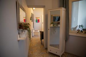 Televízia a/alebo spoločenská miestnosť v ubytovaní Apartament u Olechny 4