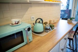 Kuchyňa alebo kuchynka v ubytovaní Apartament u Olechny 4