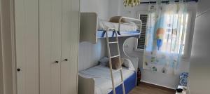 Postel nebo postele na pokoji v ubytování ATICOS Primera Linea en ZAHARA DE LOS ATUNES + 37 fotografií
