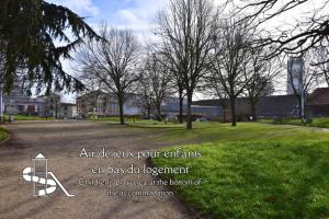 an image of a park with trees and a playground at Tour Pleyel - Duplex Lumineux in Saint-Denis