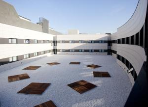 a view from the top of a building with wooden floors at Hotel Carris Marineda in A Coruña