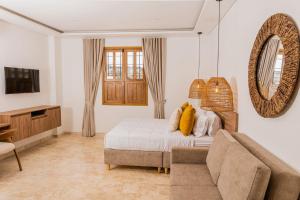 TV a/nebo společenská místnost v ubytování Del Mar Guest House