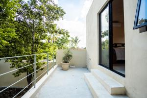 梅里達的住宿－Casa Tsapot，享有房屋景致的阳台