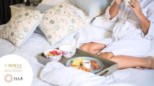 Letto o letti in una camera di Illa Experience Hotel