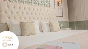 Letto o letti in una camera di Illa Experience Hotel