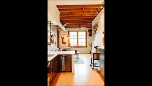 a kitchen with a sink and a counter top at Broken Clock in Springfield