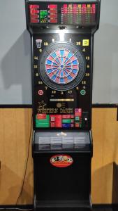 a machine with a dart board on top of it at Penzion Tágo Bohumín in Bohumín