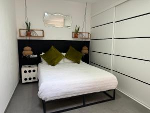 Кровать или кровати в номере NUEVO Casco Antiguo, playa y castillo