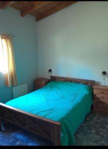 Postel nebo postele na pokoji v ubytování Cabaña Serrana