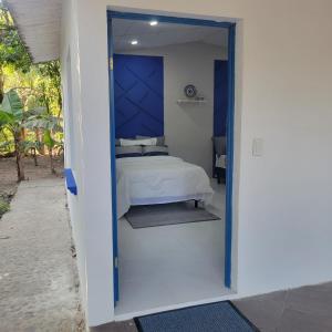 מיטה או מיטות בחדר ב-RANCHO SARIMAR