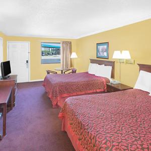 Ένα ή περισσότερα κρεβάτια σε δωμάτιο στο Travel Inn North Little Rock
