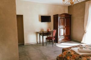 Телевизор и/или развлекательный центр в Masseria PerBacco Country House
