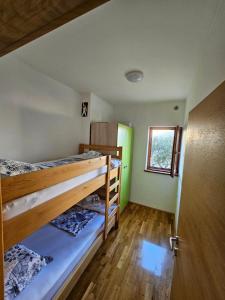 Postel nebo postele na pokoji v ubytování Apartman More