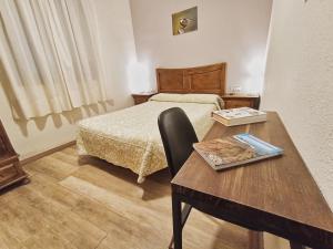 A bed or beds in a room at Casa Gerbe