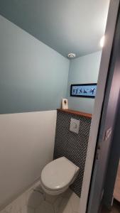 a bathroom with a white toilet in a room at Blue Note Home, Port Vieux, Parking, Crew, Couple in La Ciotat +22 photos