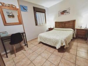 A bed or beds in a room at Casa Gerbe