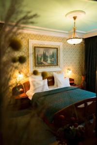 Postel nebo postele na pokoji v ubytování Bucharest Comfort Suites Hotel