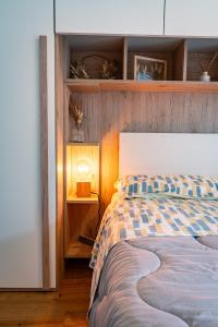 Postel nebo postele na pokoji v ubytování Glam Turin Apartment