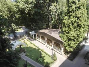 an overhead view of a garden with a building at Delice in Lviv