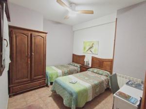 A bed or beds in a room at Casa Gerbe