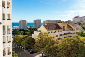 an aerial view of a city with buildings at Estepona Puerto Blanco Appartement - Casa Valk in Estepona