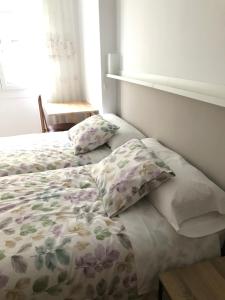 Llit o llits en una habitació de Piso Cuatro Caminos
