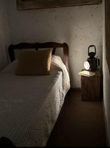Una cama o camas en una habitación de Apart Suite Rural, Grupo Cabaña La Triada
