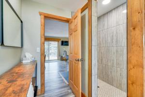 a hallway with a door leading into a room at Idyllic Rye Cabin Deck with Mountain Views! in Rye +20 photos