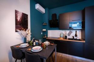 TV a/nebo společenská místnost v ubytování Glam Turin Apartment